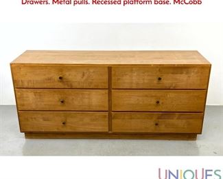 Lot 413 Modernist Credenza Low Double Dresser. Chest of Drawers. Metal pulls. Recessed platform base. McCobb