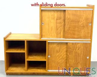 Lot 460 Birch handmade McCobb style cabinet with sliding doors.