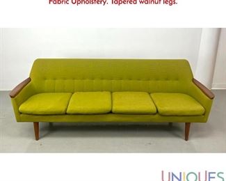 Lot 549 Danish Modern Sofa with Wood Arm Rests. Tufted Bright Fabric Upholstery. Tapered walnut legs.
