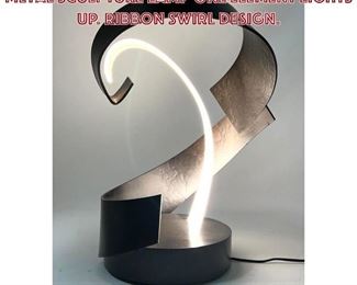 Lot 650 Striking Modernist Lucite and Metal Sculpture Lamp One element lights up. Ribbon swirl design. 