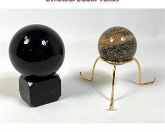 Lot 695 Two Polished Stone Spheres on Stands. Sculpture. 