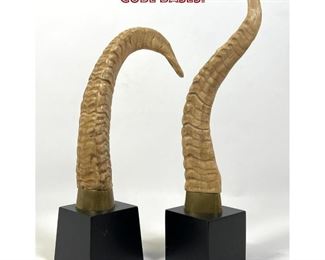 Lot 740 2pc Faux Horn Sculptures on Cube Bases. 