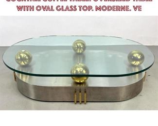 Lot 746 Designer Stainless and Brass Cocktail Coffee Table. Oversized Table with Oval Glass Top. Moderne. Ve