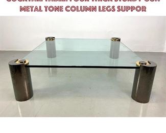 Lot 835 KARL SPRINGER Signed Metal Glass Cocktail Table. Four Thick Sturdy Gun Metal Tone Column legs suppor