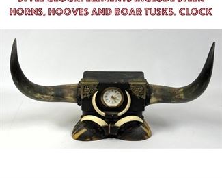 Lot 887 Highly Unusual Safari Trophy style Clock. Elements include Steer Horns, Hooves and Boar Tusks. Clock