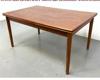 Lot 933 Danish Modern Teak dining table with refractory leaves. Labeled Denmark