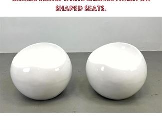 Lot 982 Pr Molded Modernist White Ball Chairs Seats. White enamel finish on shaped seats.