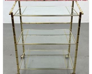 Lot 1054 Rolling Metal Faux Bamboo Three Tier Serving Cart. Glass shelves.