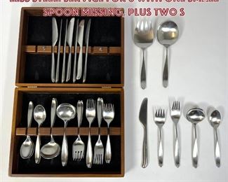 Lot 1057 LAUFFER Design 2 Flatware. Stain less steel. Service for 8 with one small spoon missing, plus two s