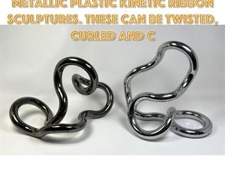 Lot 1225 Hours of Fun Two Metallic Plastic Kinetic Ribbon Sculptures. These can be twisted, curled and c