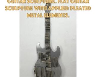 Lot 1258 Modernist Large Figural Guitar Sculpture. Flat Guitar Sculpture with Applied Pleated Metal Elements.