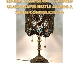 Lot 1275 Vintage Intricate Brass Leaded Glass Shade. Colored Glass Grapes nestle among a shade constructed o