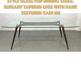 Lot 1341 Contemporary Gio Ponti style Glass Top Dining Table. Elegant Tapered Legs with Bark Textured Cast Me