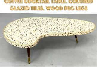 Lot 1407 Mini Tile Boomerang Top Coffee Cocktail Table. Colored glazed tiles. Wood peg legs