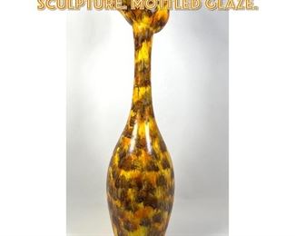 Lot 1581 Pottery Giraffe form Tall Sculpture. Mottled Glaze. 