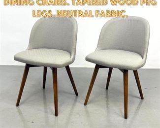 Lot 1614 Pr Upholstered Side Dining chairs. Tapered Wood Peg Legs. Neutral fabric.