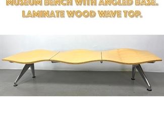 Lot 1651 Designer Wave Form Museum Bench with Angled Base. Laminate wood wave top. 
