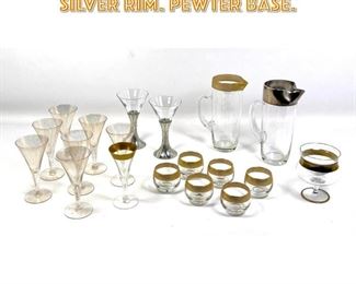 Lot 1735 Stemware. Gold and Silver rim. pewter base. 