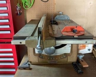 Table Saw with Table and saw dust receptacle 