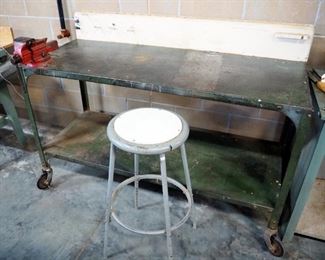 Work Table With Lower Shelf, On Wheels, Includes Mounted Desmond Bench Vise No. 400, Custom Rack For Lathe Tools, And Adjustable Height Shop Stool