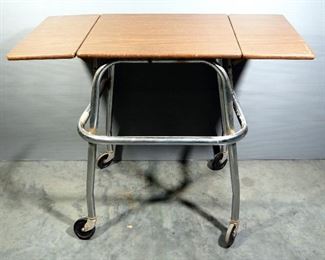 Rolling Table With Fold Down Sides And Coat Rack With Acrylic Sheet Attached To Top