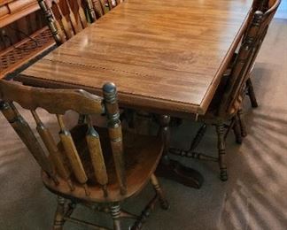 Dining table with two leafs, they go on each end. 6 chairs 