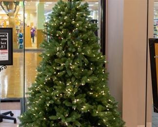 We have several Christmas trees in our sale.  This one is amazing!  The lights all work, and no 'fluffing' is needed.  The branches just fell into place:)