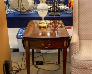 This side table has fold up 'arms', so can be extended.