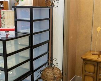 Wrought iron, wicker coat rack.
