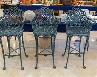 Wrought iron bar stoools.