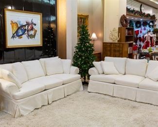 These sofas have custom made slip covers on them.