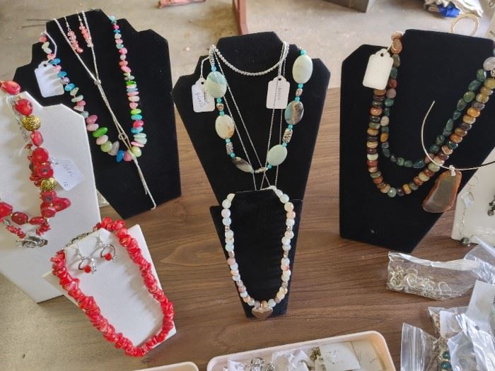 Handmade coral, jasper, and and aget jewelry.