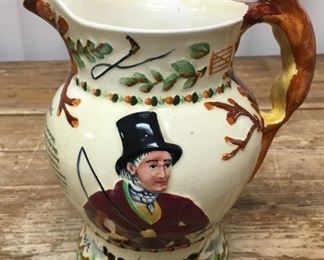 John Peel was an English Huntsman who lived from 1776 to 1854.  Crown Devon Musical Jug Pitcher Fox Hunt Horses Hunting How Dry I Am plays when you wind up the Swiss Thorens Movement music box and lift it up.  England English Fieldings Crown Devon.  Figural Fox handle.  8 1/2 by 6 3/4". 