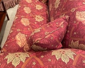 Red floral sofa.