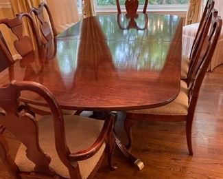 Dining room table (with leaves) and six chairs.