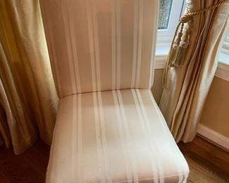 Pair of taupe and white striped side chairs.