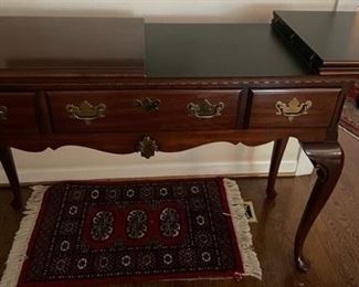 Buffet table that opens on both sides.