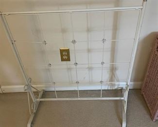 Metal quilt rack.