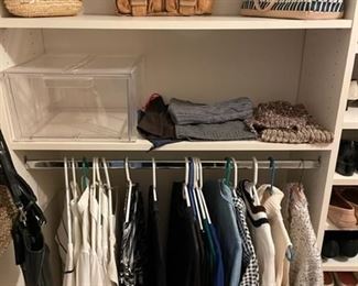 Women's clothes, shoes and purses.