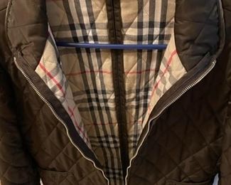 Women's clothes, shoes and purses. Nice Selection of designer clothes - St. John's, Burberry and more.