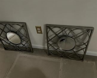 Pair of decorative mirrors.
