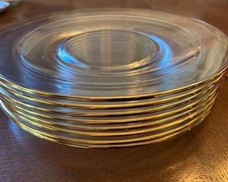 Set of clear glass plates with gold rim