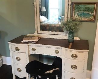 Farmhouse vanity and cow hide stool