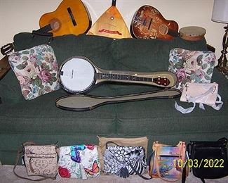 Sleeper sofa, acoustic guitars (Global and Singing Cowboys), Franciscan banjo, Mockba 80 Russian guitar, designer handbags by Anuschka, Michael Kors, Calvin Klein, Fossil, etc...