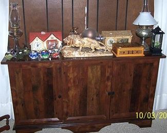 Credenza, motion clocks, cowboy lamp, paperweights, etc...