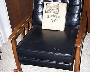 Black leather recliner, printer's stone