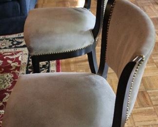 Pair of taupe suede side chairs