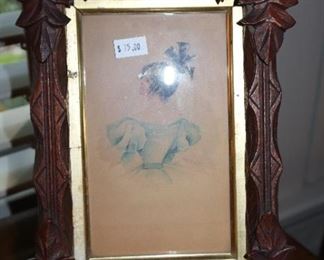 Antique wooden frame and drawings