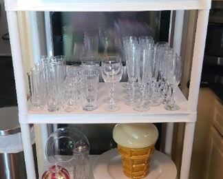 Clear glass pitcher top right shelf and ice cream cone cookie jar = SOLD