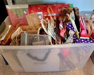 Tote full of gently used all sizes gift bags 
